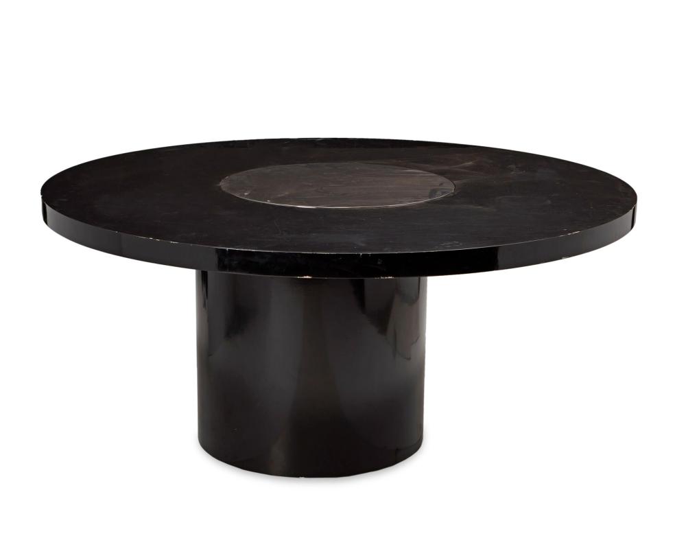 Appraisal: A modern-style black lacquered dining table with Lazy Susan th