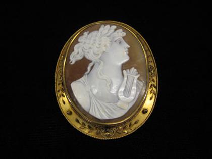 Appraisal: Large cameo in gold fill frame White cameo of a