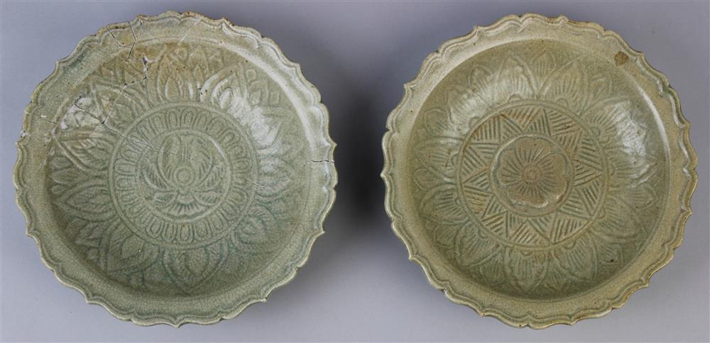 Appraisal: TWO SOUTHEAST ASIAN CARVED CELADON DISHES with barbed rims enclosing