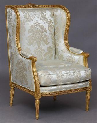 Appraisal: LOUIS XVI-STYLE CARVED GILTWOOD BERGERE A L'OREILLES With foliate-carved frame