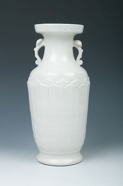 Appraisal: WHITE GLAZED VASE RUYI HANDLE Of archaic hu form flanked