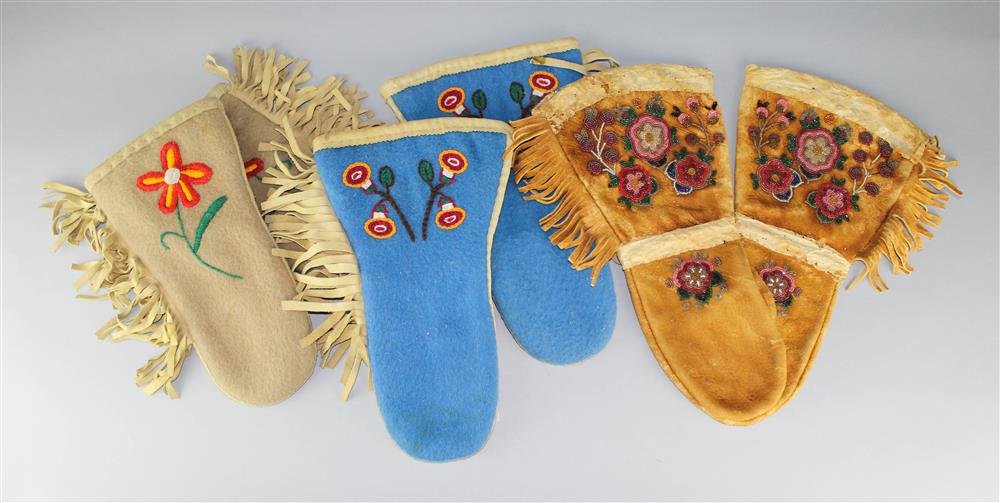 Appraisal: THREE PAIRS OF ATHABASKAN MITTENS one early th C beaded