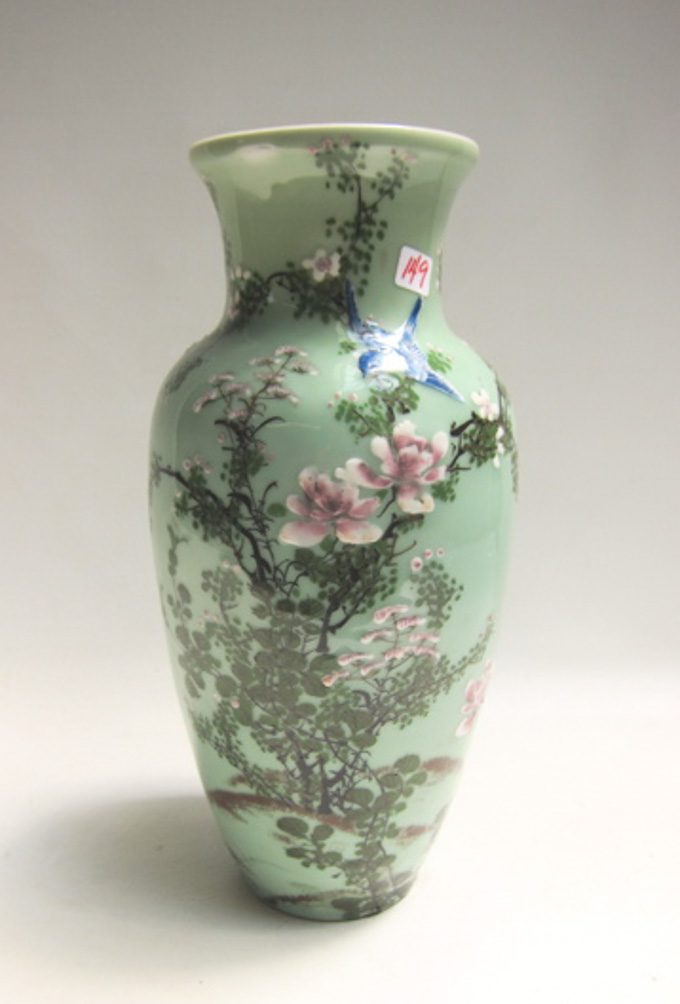 Appraisal: CHINESE CELADON PORCELAIN BALUSTER-FORM VASE with raised enamel cherry blossom