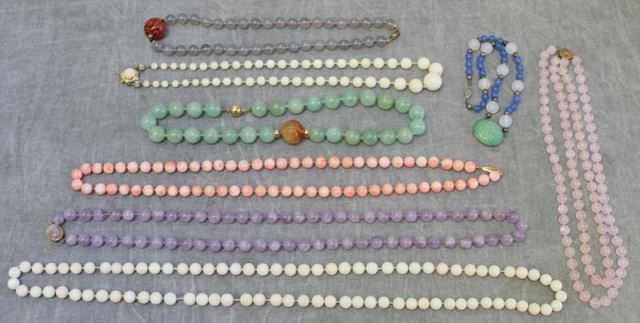 Appraisal: Miscellaneous Jade and Hardstone Necklaces Includes a pale green necklace