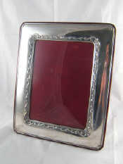 Appraisal: A large silver faced photo frame with strut back Italian