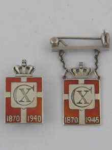 Appraisal: Two WWII silver enamelled Danish patriotic badges by Georg Jensen