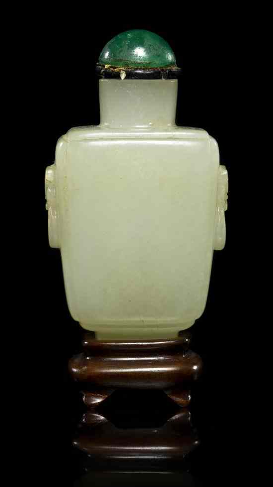 Appraisal: A White Jade Snuff Bottle having a cylindrical neck above