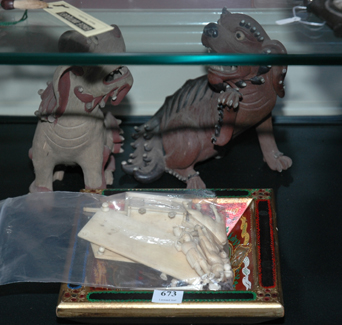 Appraisal: A GROUP OF COLLECTABLES Including two terracotta dogs bone carvings