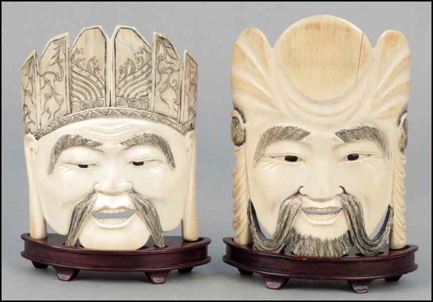 Appraisal: TWO CARVED IVORY PLAQUES Depicting a crowned figure and another