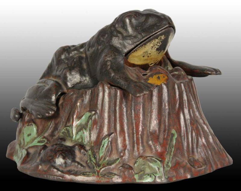 Appraisal: Cast Iron Toad on Stump Mechanical Bank Description Manufactured by