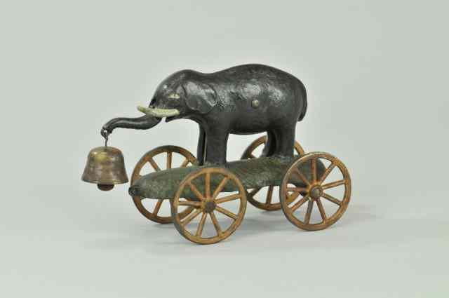 Appraisal: ELEPHANT BELL TOY N N Hill c cast iron elephant