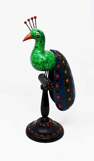 Appraisal: Don Noyes Paint decorated wooden bird Carved decorated wooden bird