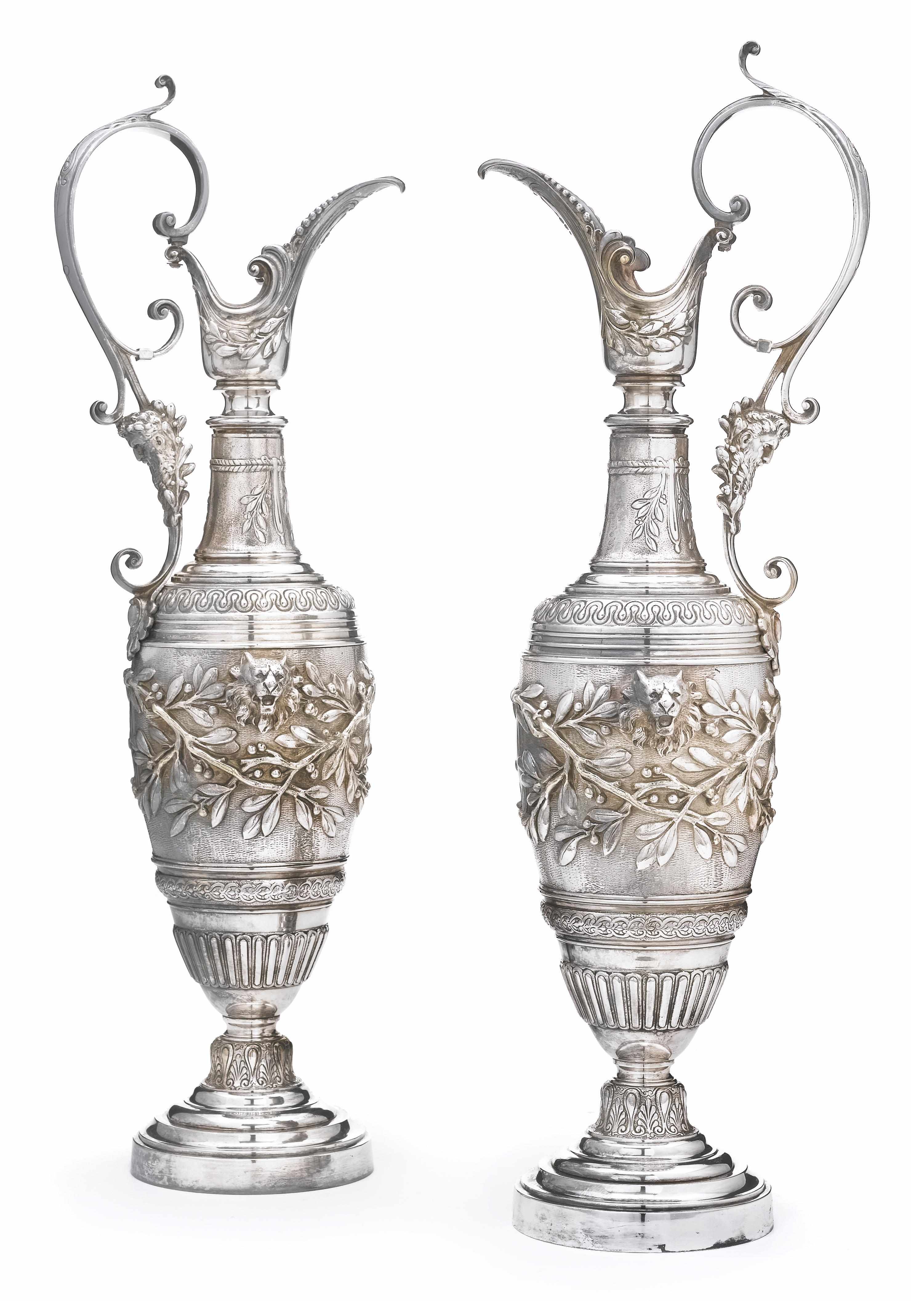 Appraisal: A pair of silver plated garnitures as ewers in the