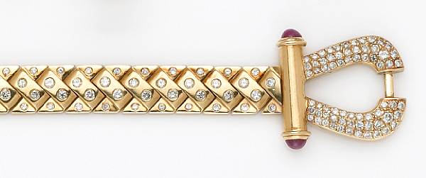 Appraisal: A diamond ruby and fourteen karat gold bracelet of buckle