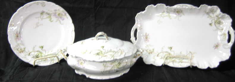 Appraisal: GERMAN PORCELAIN DINNER SERVICE Floral stamped Bruder Thannhauser Munchen pattern