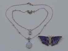 Appraisal: A mixed lot comprising a silver butterfly with stained mother