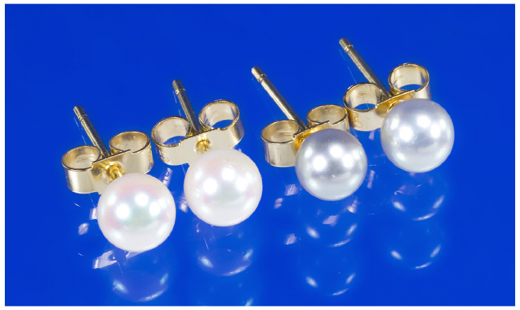 Appraisal: Two Pairs Of ct Gold Set Pearl Earrings