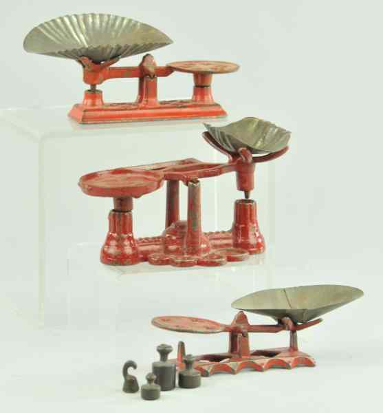 Appraisal: GROUPING OF MINIATURE SCALES Cast iron painted in red w