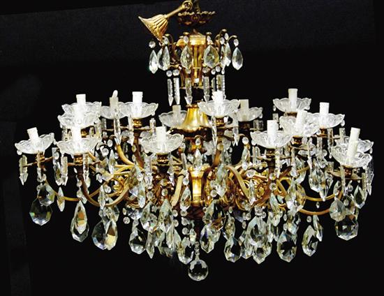 Appraisal: Continental gilt-bronze and crystal twenty-light chandelier early th century H