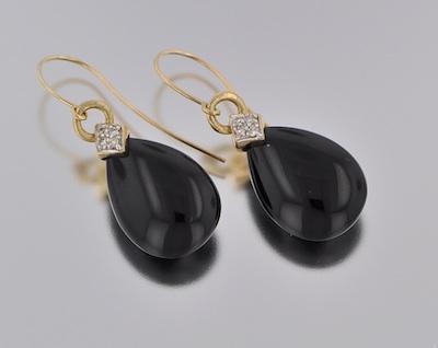 Appraisal: A Pair of Onyx and Diamond Earrings k yellow gold