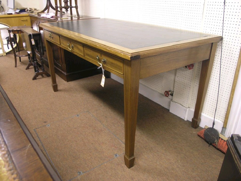 Appraisal: An inlaid mahogany writing desk the top with inset green