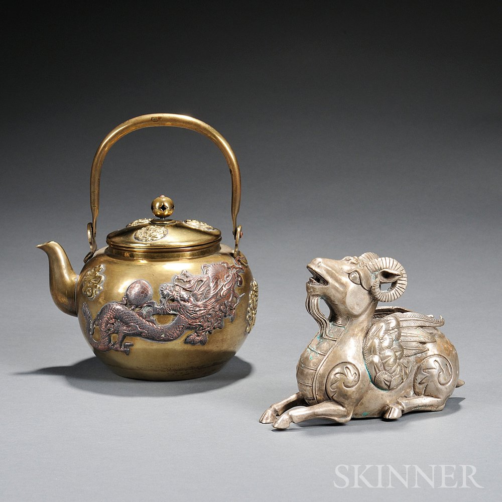 Appraisal: Two Brass Items China a yellow brass kettle with horseshoe-shaped