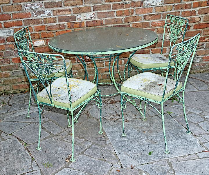 Appraisal: Green Iron Patio Set A ca table with chairs