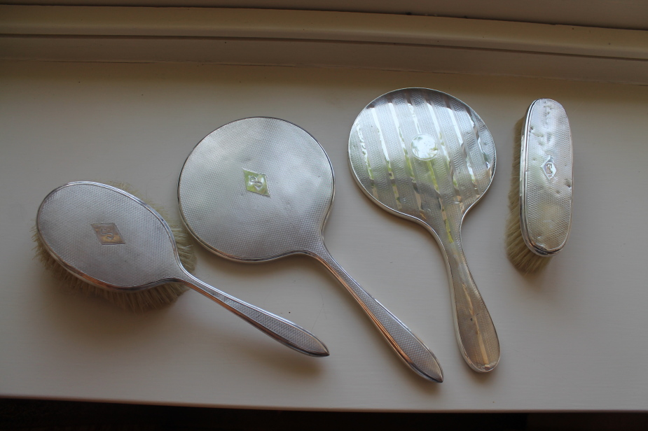 Appraisal: Two silver hand mirrors and two brushes