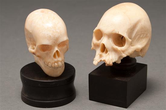 Appraisal: Two Continental carved ivory skulls late th century each on