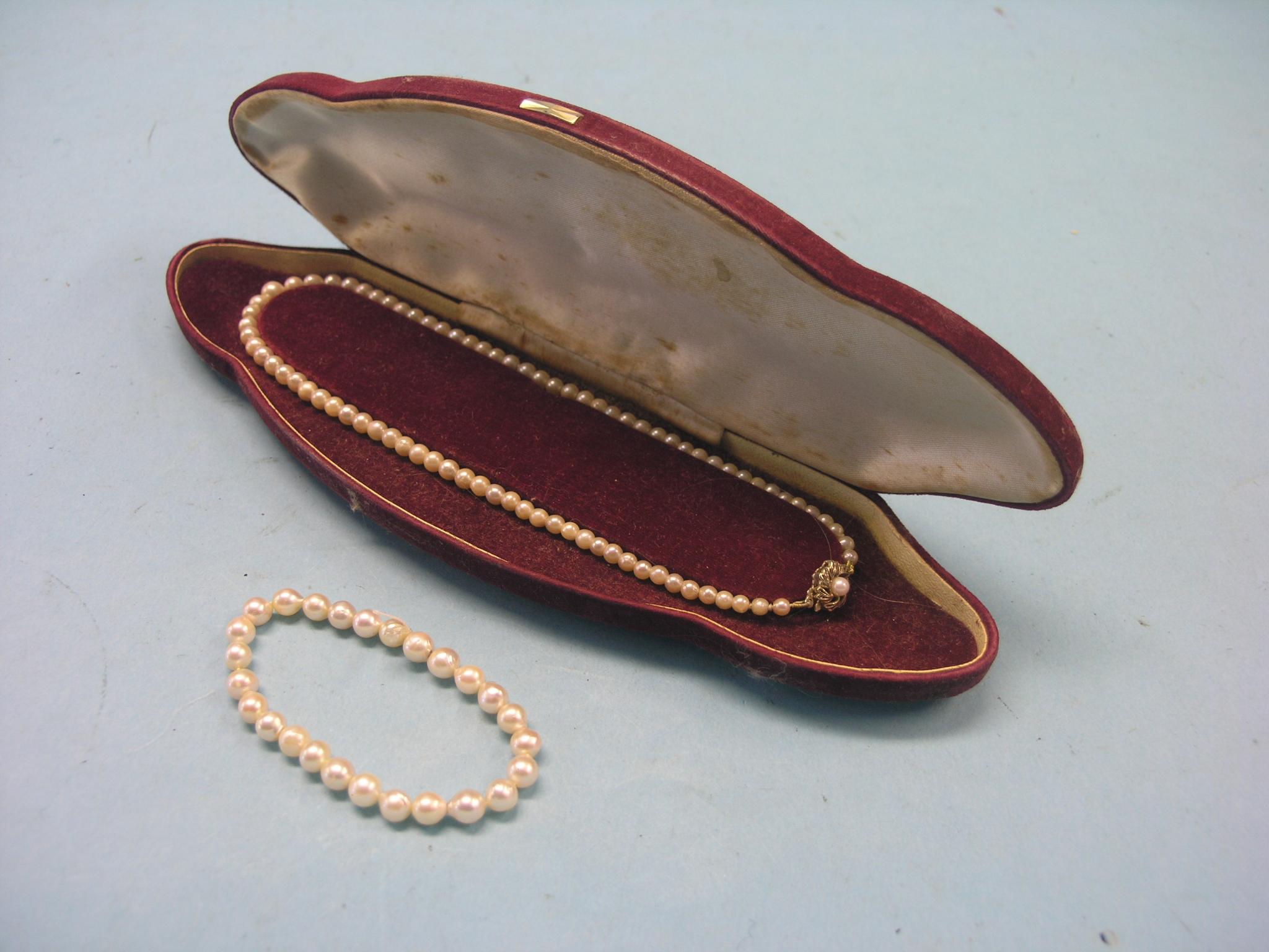 Appraisal: A pearl-type necklace with yellow metal clasp and matching bracelet