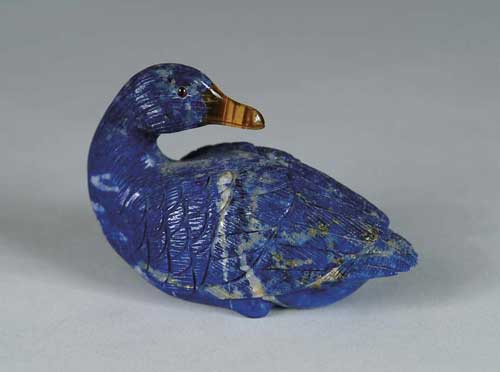 Appraisal: FABERGE STYLE LAPIS AND CAT S EYE DUCK The carved