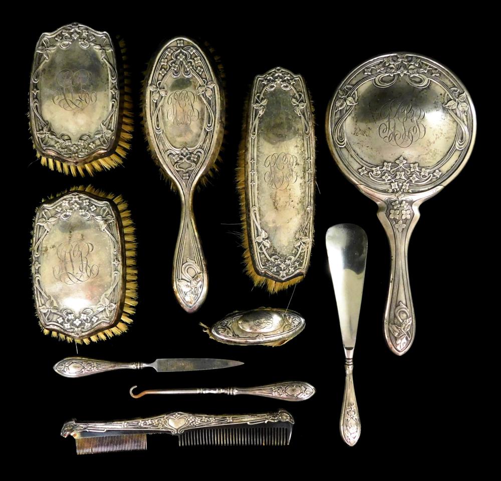 Appraisal: STERLING Ten-piece matching vanity set with Art Nouveau pattern and