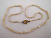 Appraisal: A seed pearl necklace approx cm