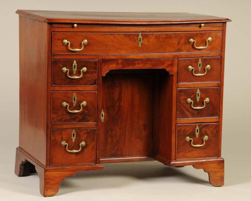 Appraisal: George II Mahogany Knee-Hole Desk Description Circa to Molded top