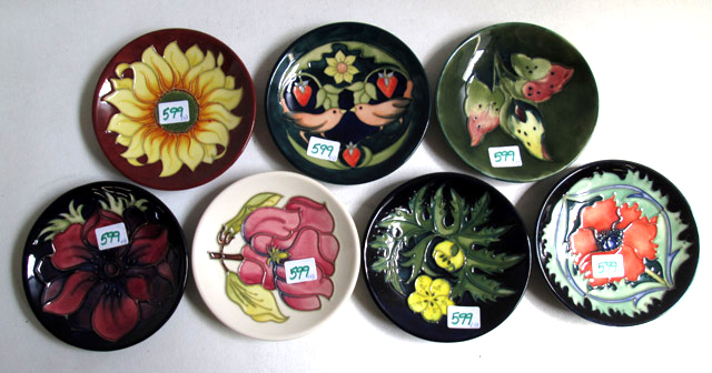 Appraisal: SEVEN MOORCROFT POTTERY DISHES hand painted under glaze in various