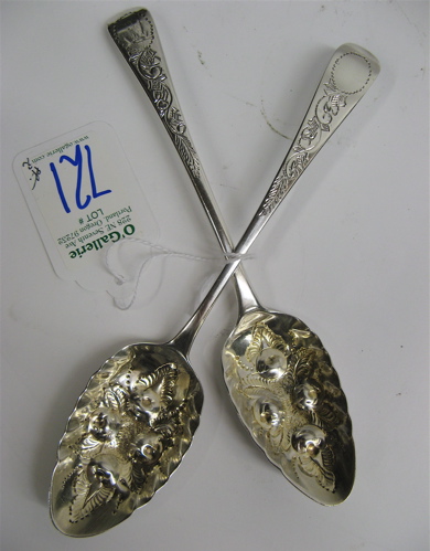 Appraisal: TWO ENGLISH GEORGIAN STERLING BERRY SPOONS the large gilt bowls