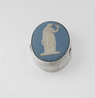 Appraisal: A modern oval box inset with a blue jasperware Wedgwood