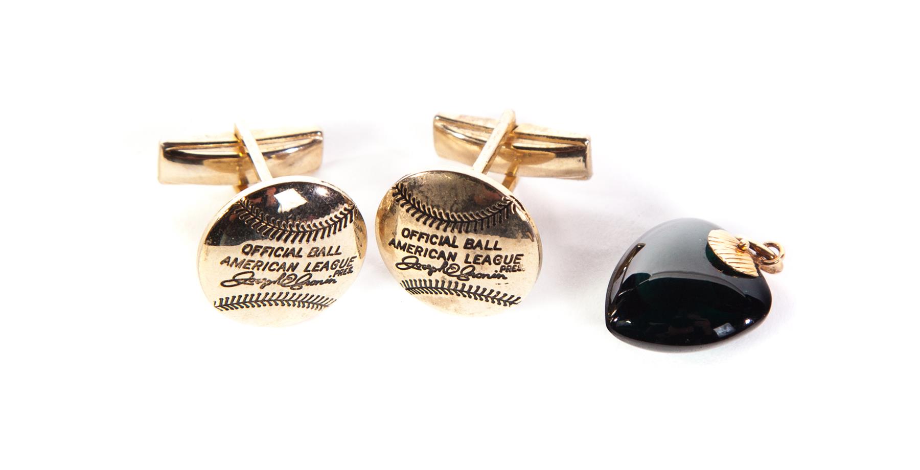 Appraisal: ROGER MARIS CUFFLINKS AND HEART SHAPED PENDANT American mid th