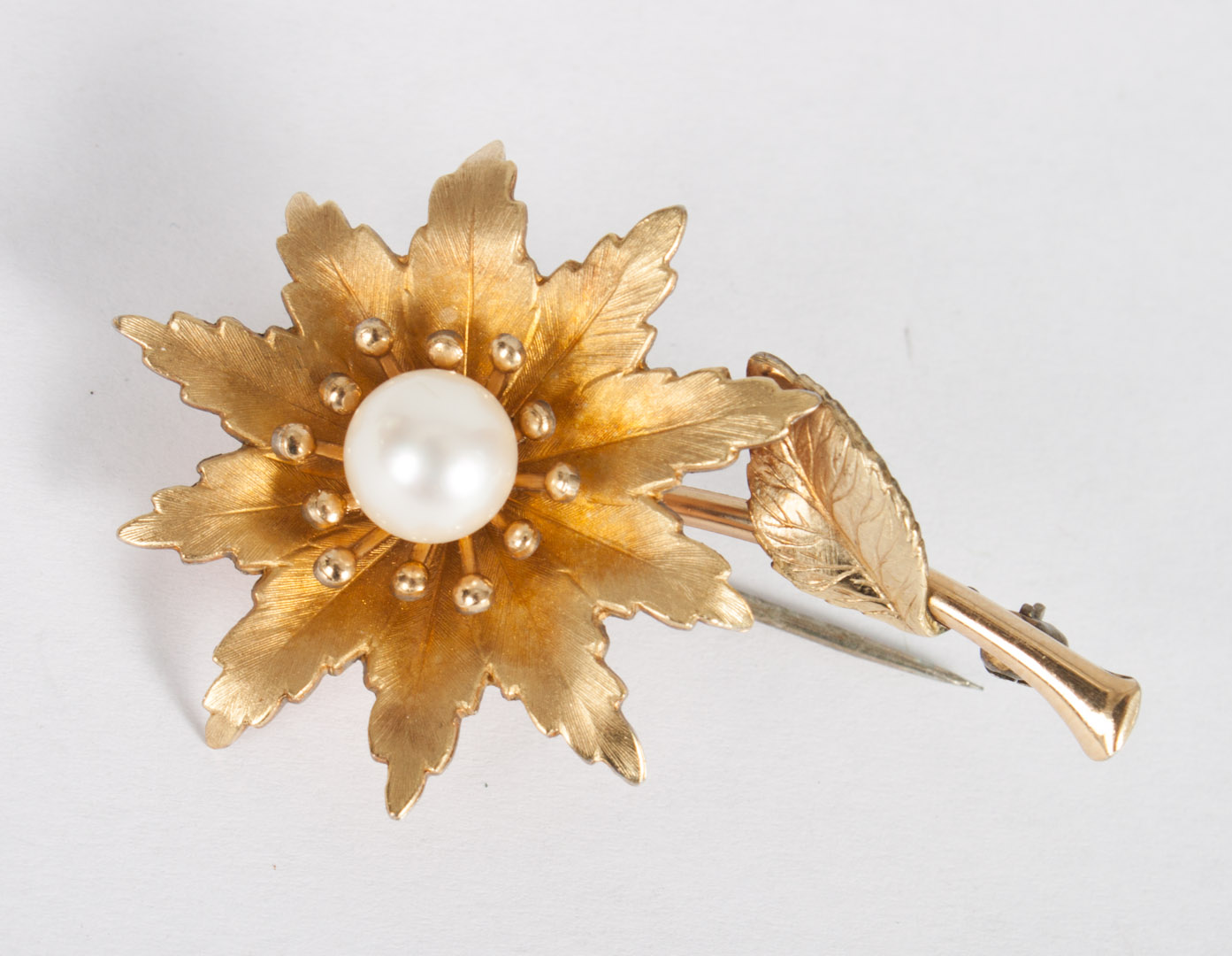 Appraisal: Krementz K gold overlay pearl flower pin with center cultured