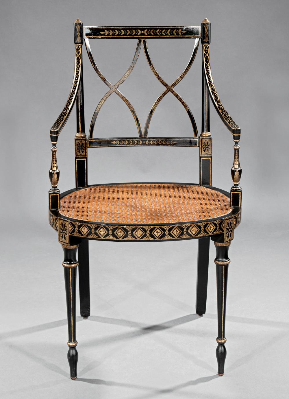 Appraisal: Regency-Style Ebonized and Gilt Decorated Armchair Neoclassical decoration caned seat