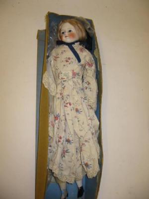 Appraisal: An early bisque turn shoulder head doll with fixed blue