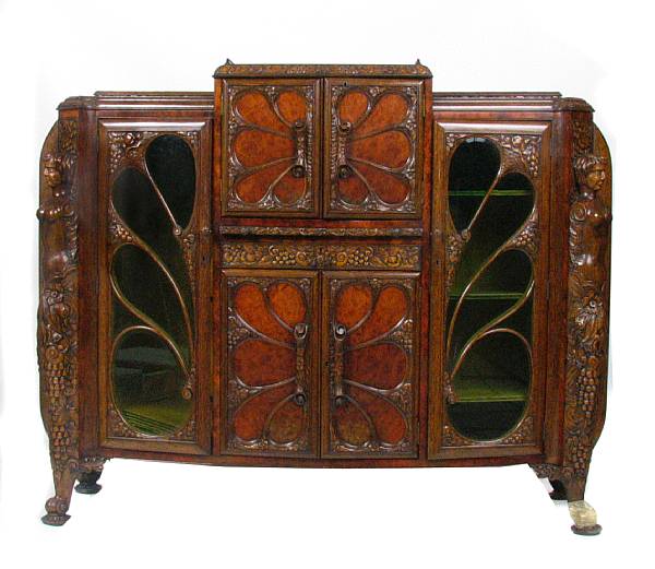 Appraisal: A Baroque style carved oak wetbar height ft in width