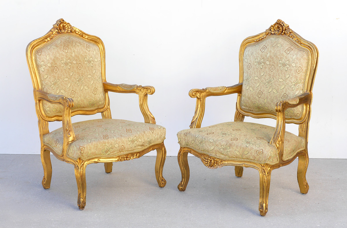 Appraisal: PAIR FRENCH FAUTEUIL GILT WOOD ARM CHAIRS Carved gold decorated