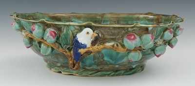 Appraisal: A Majolica Center Bowl with Applied Bird and Fruit th