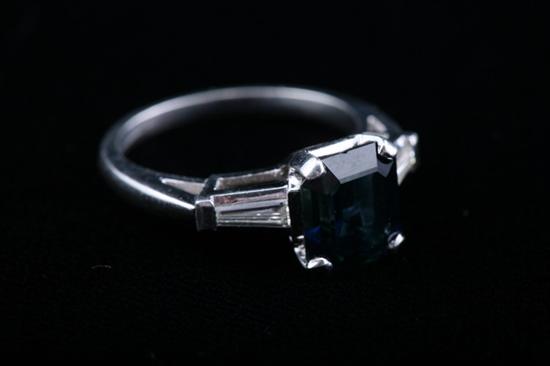 Appraisal: PLATINUM DIAMOND AND SAPPHIRE EMERALD CUT RING Emerald-cut sapphire weighing