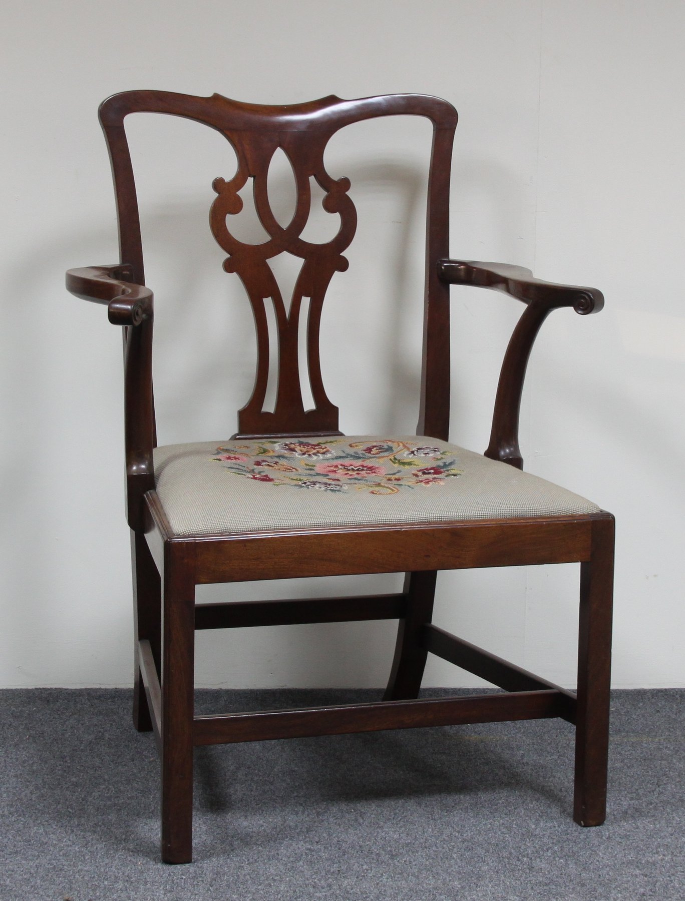 Appraisal: An th Century mahogany armchair of Chippendale style with pierced