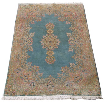 Appraisal: Iranian Kerman Carpet An unusual light blue color with sage