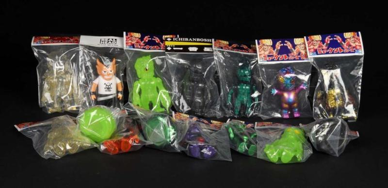 Appraisal: Lot of Vinyl Figures Description Japanese Real x Head Condition