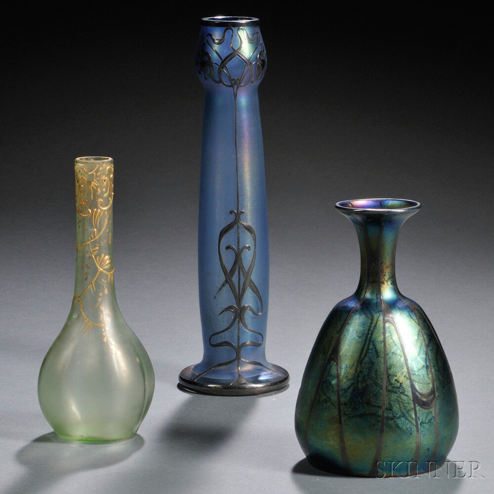 Appraisal: Three Iridescent Art Glass Vases Art glass silver enamel Early