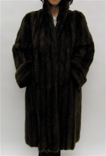 Appraisal: A LADY'S FULL LENGTH MUSKRAT COAT striated medium and dark